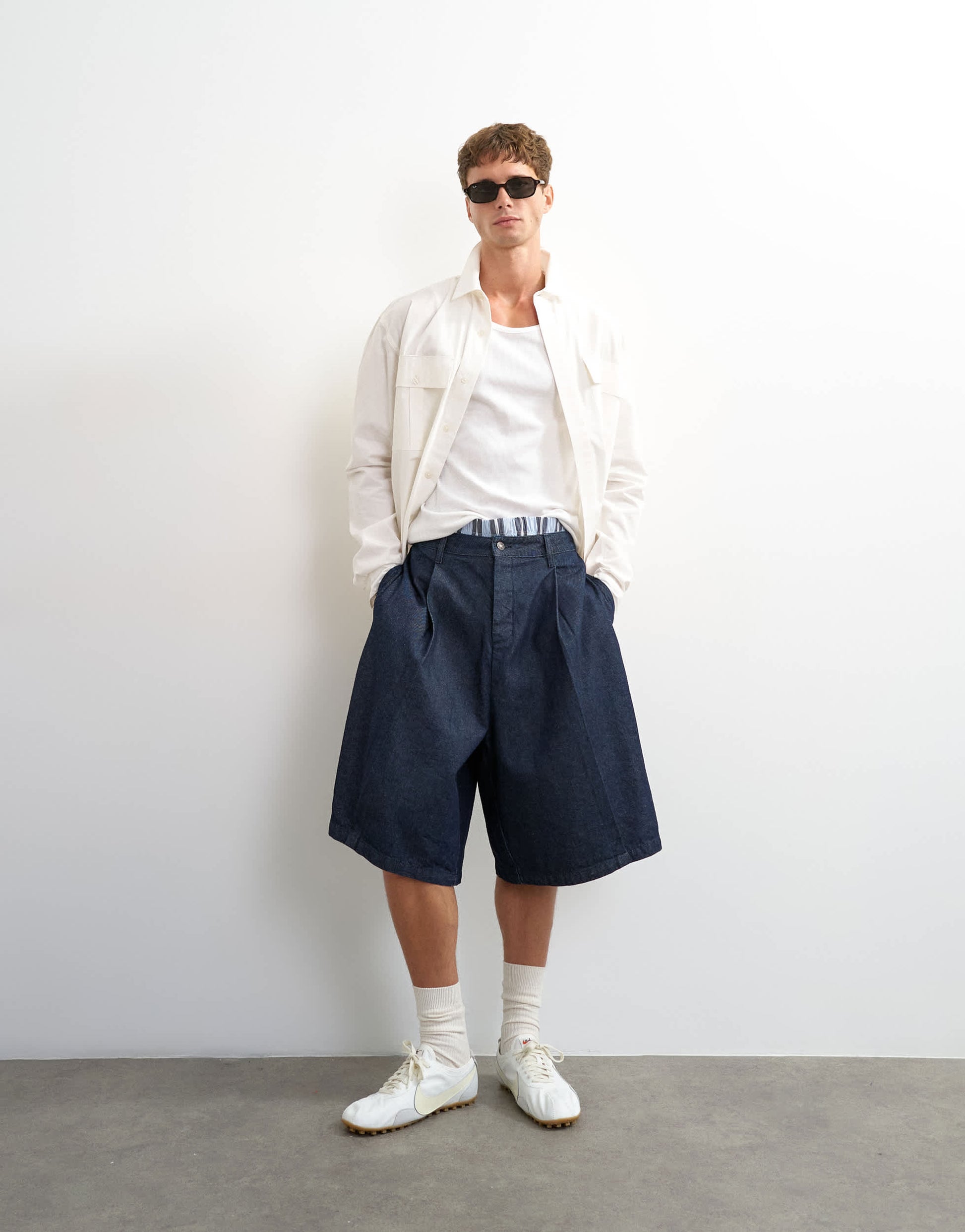 Topman wide leg denim bermuda short with pronounced pleat in mid-wash blue