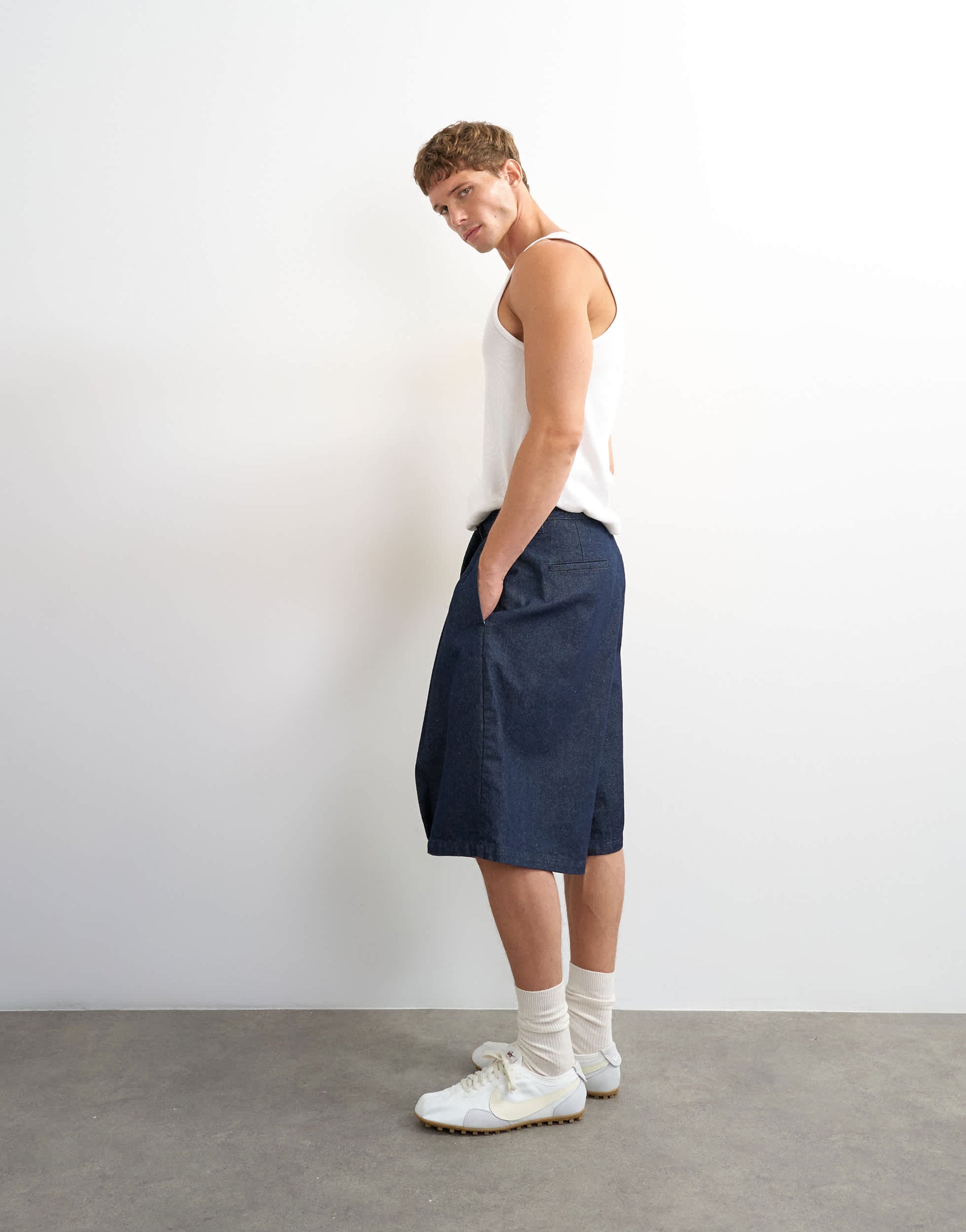 Topman wide leg denim bermuda short with pronounced pleat in mid-wash blue