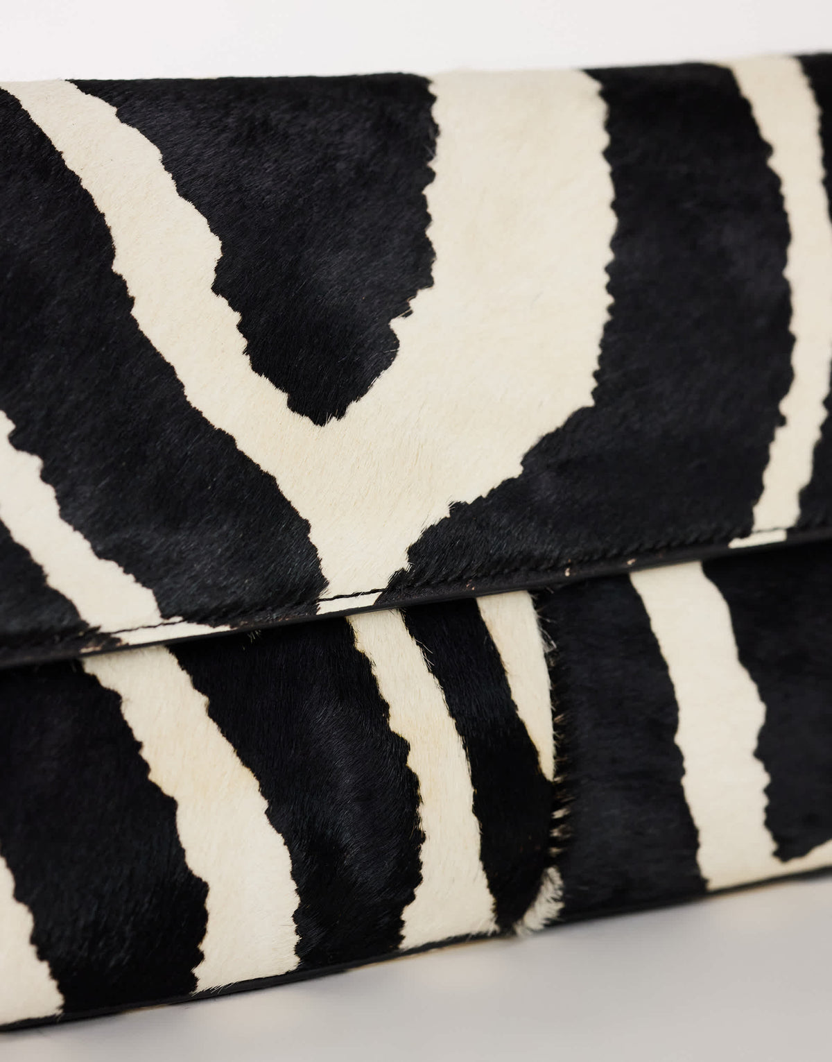 Topshop Clark medium hair on real leather fold over clutch bag in zebra
