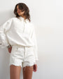 Topshop denim A-line short with rip in white
