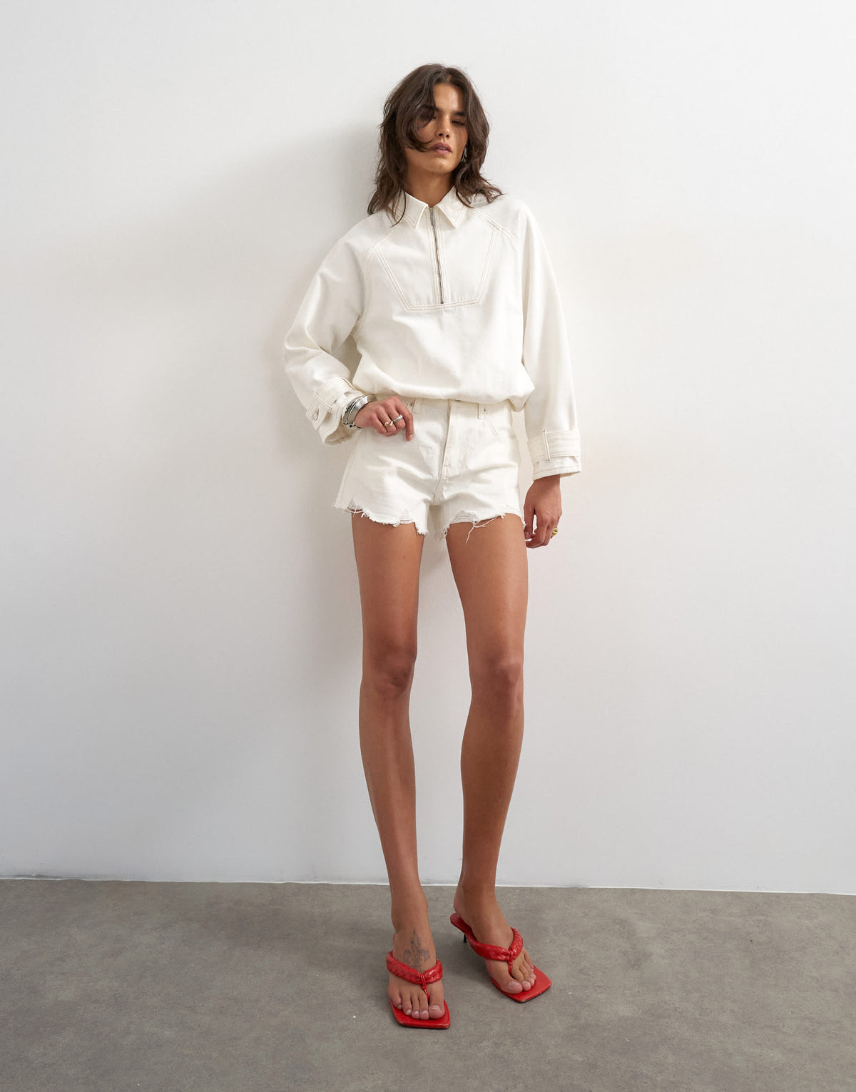 Topshop denim A-line short with rip in white