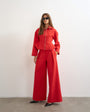 Topshop tailored pleat detail low rise wide leg trousers in red