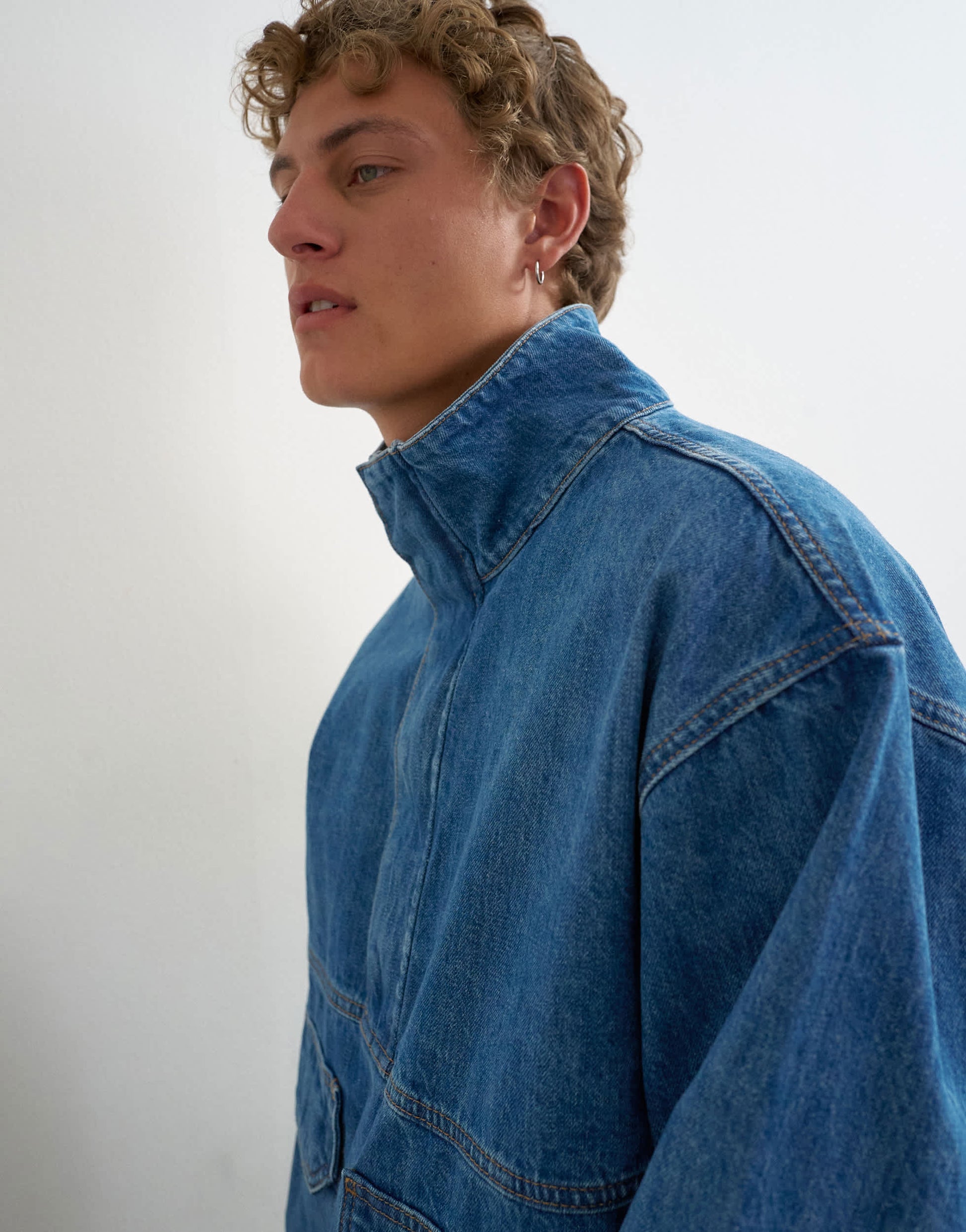 Topman oversized fit denim jacket with funnel neck in mid wash