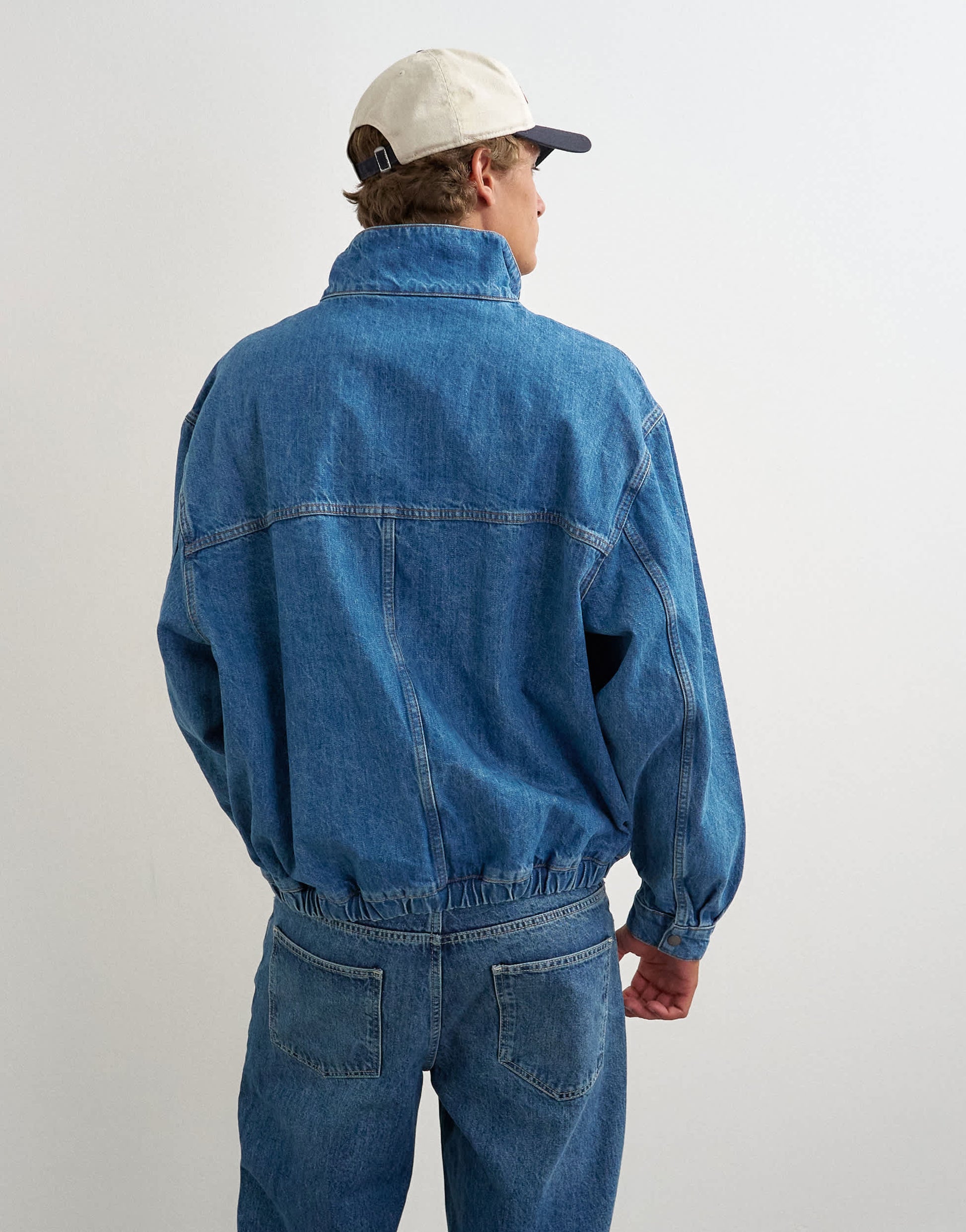 Topman oversized fit denim jacket with funnel neck in mid wash
