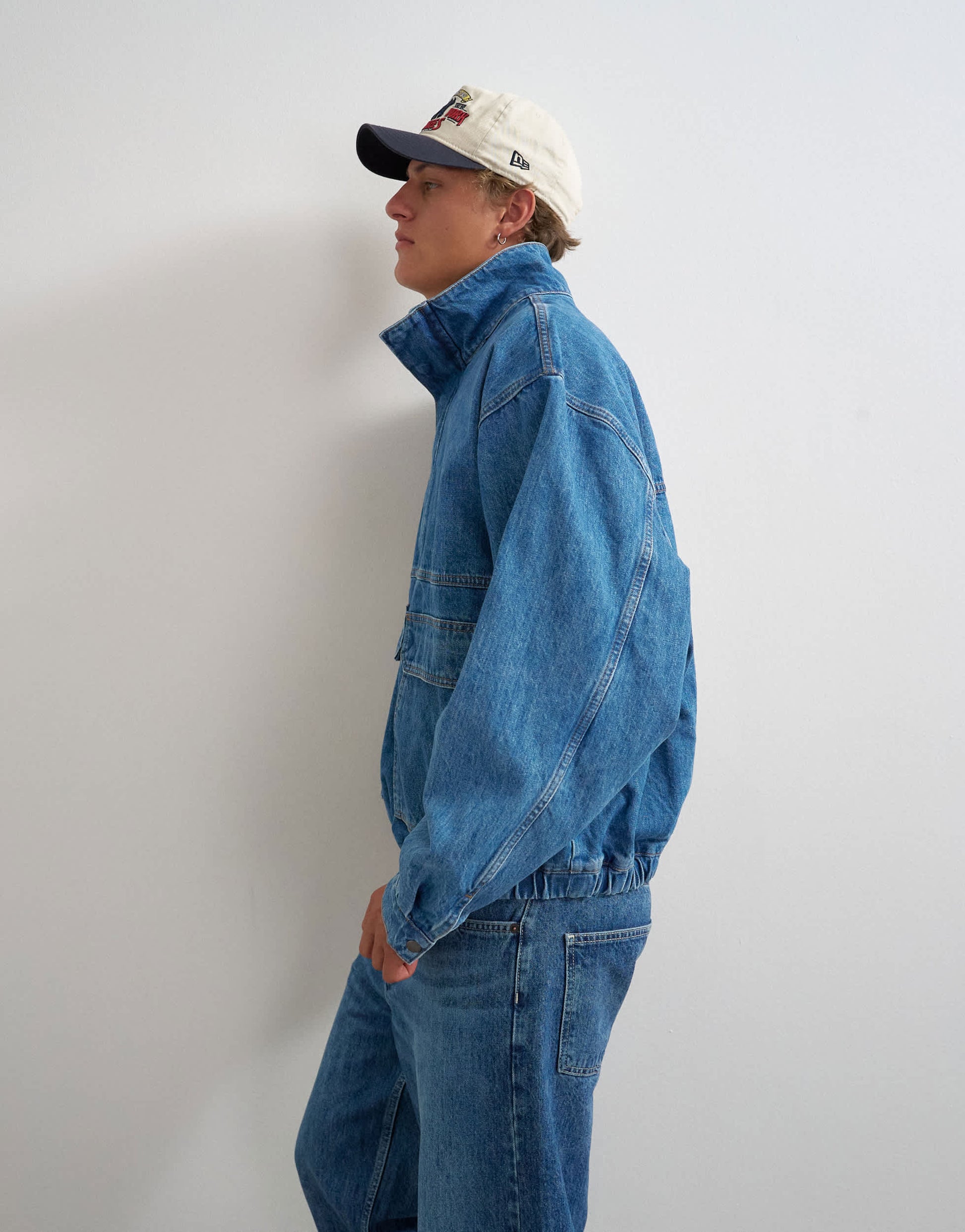Topman oversized fit denim jacket with funnel neck in mid wash