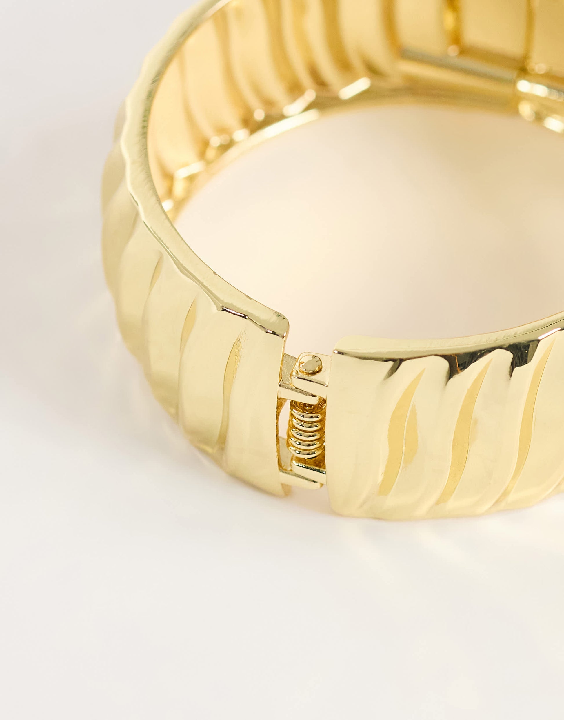 Topshop Blossom chunky bangle in gold