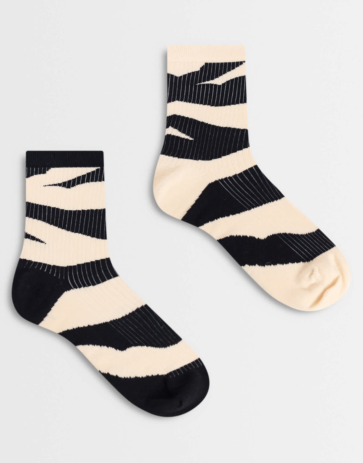 Topshop Leo 2 pack zebra print socks in black and white