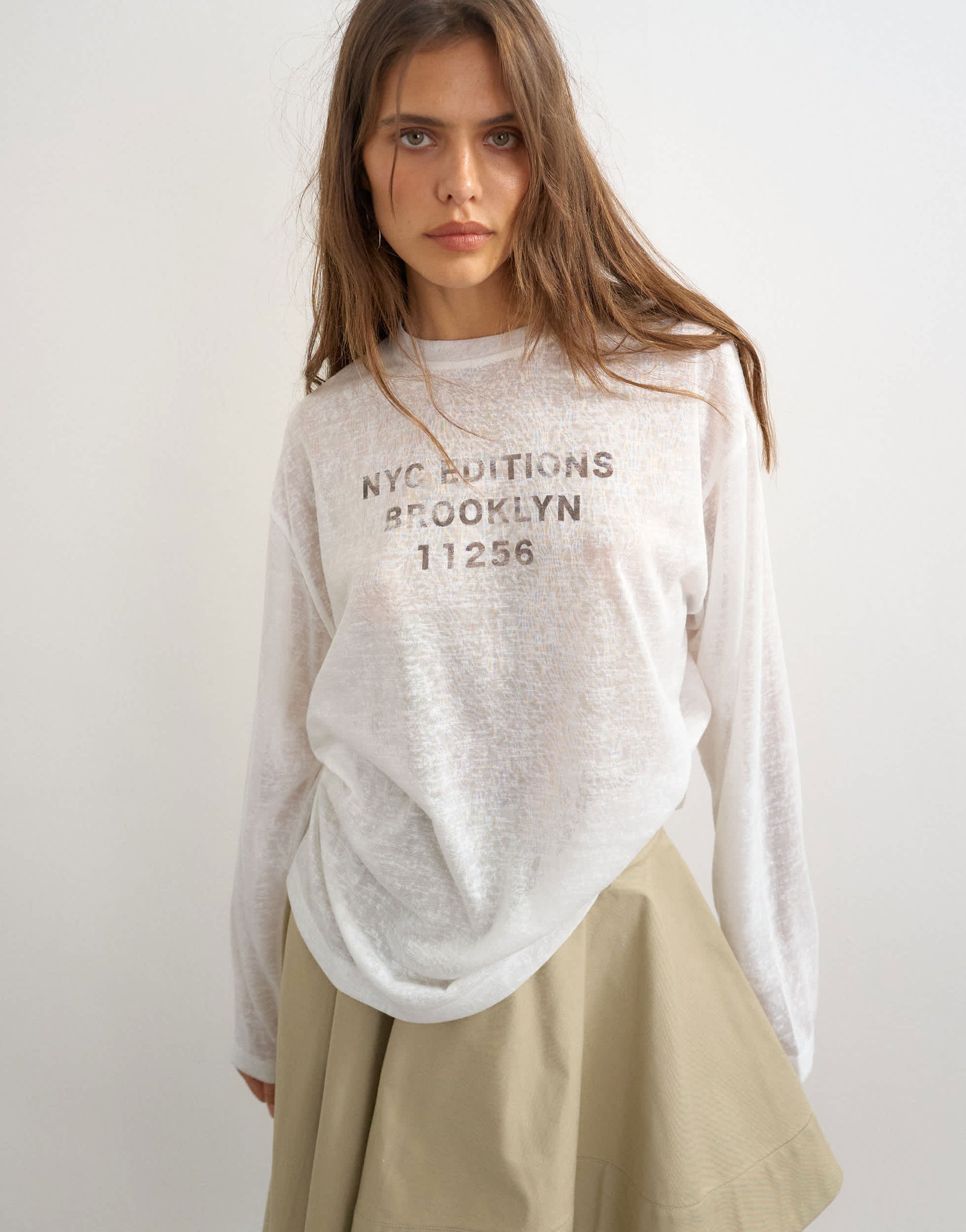 Topshop sheer slubby graphic 'NYC' long sleeve top in ecru