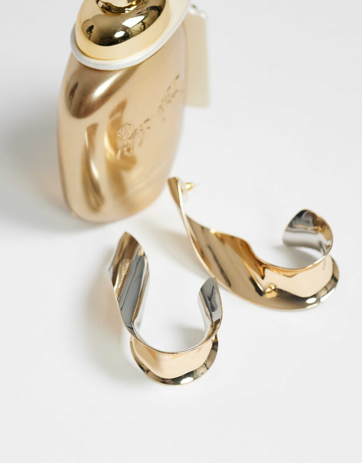 Topshop Freyja twisted earring in gold and silver