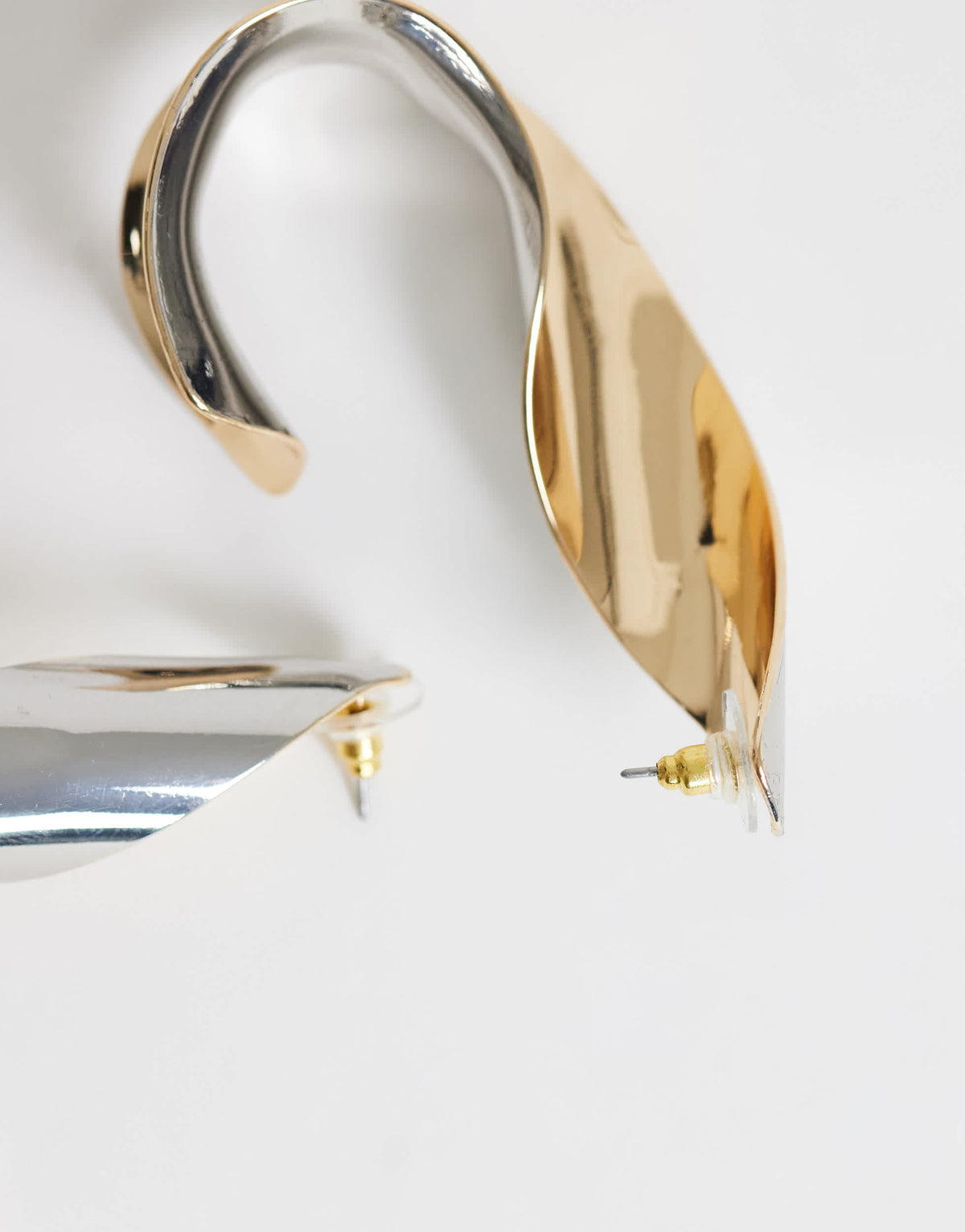 Topshop Freyja twisted earring in gold and silver