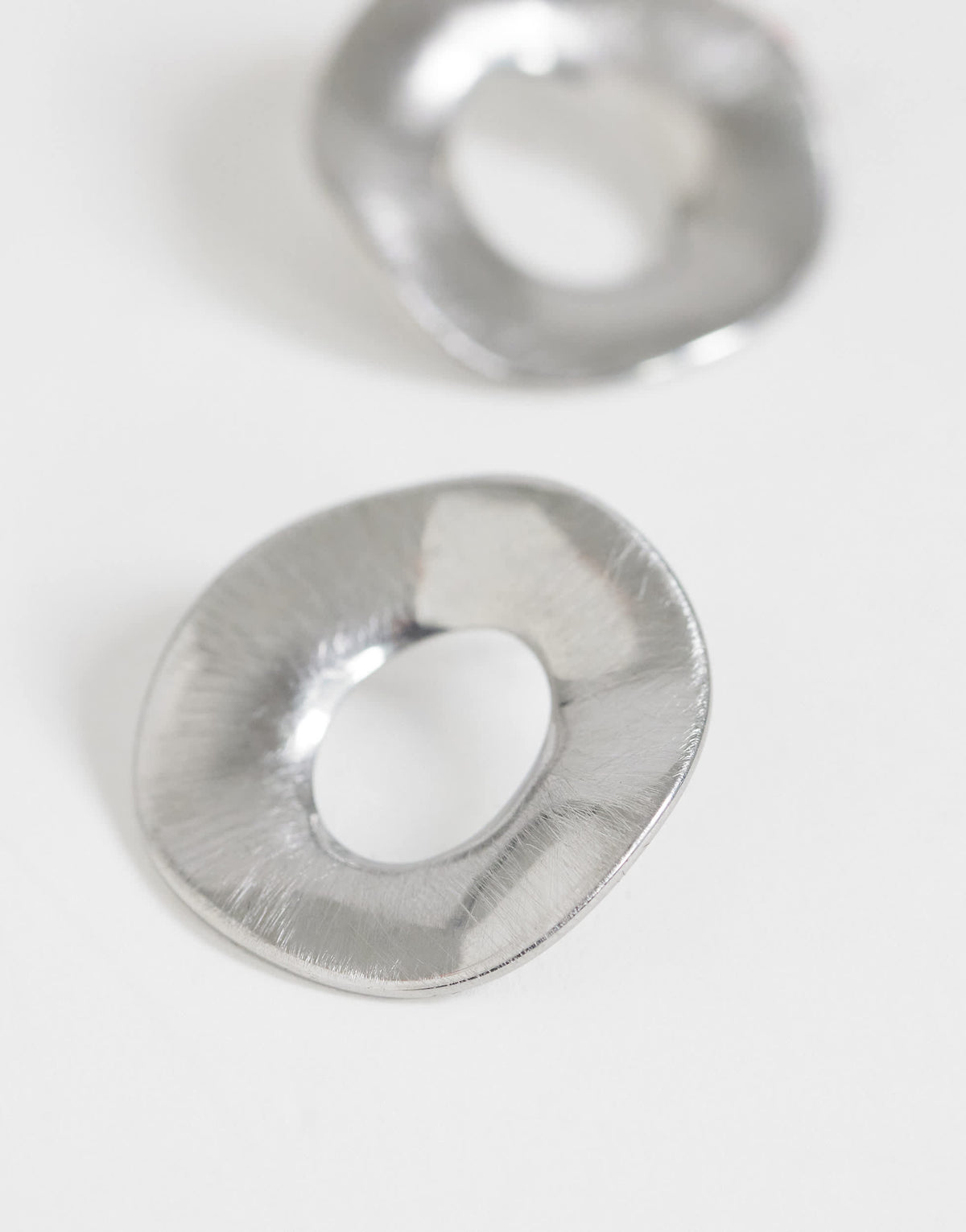 Topshop Francis waterproof stainless steel round earrings in silver brushed