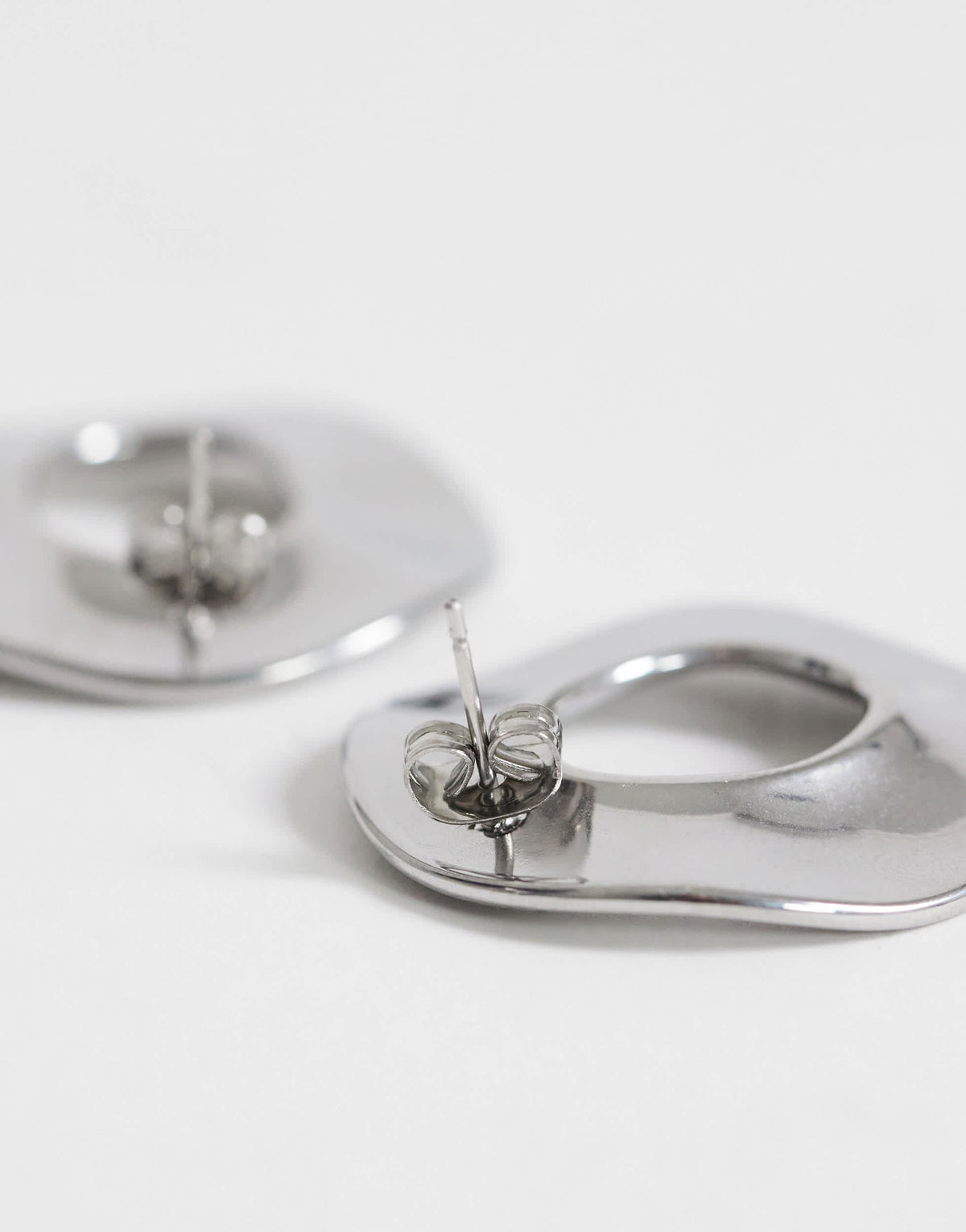 Topshop Francis waterproof stainless steel round earrings in silver brushed