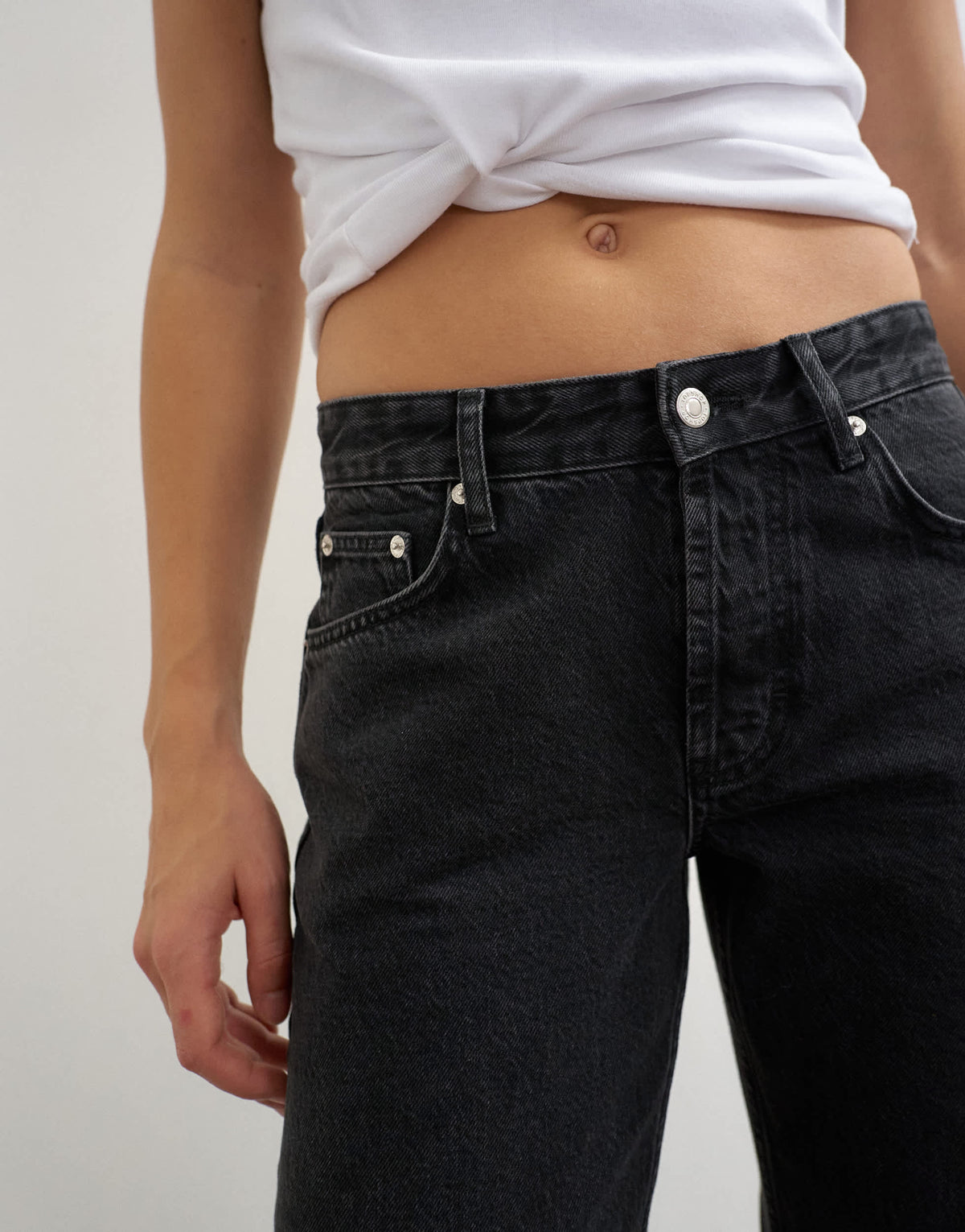 Topshop mid rise straight leg jean with lace up detail in washed black